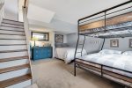  bedroom featuring multiple sleeping options on lower level